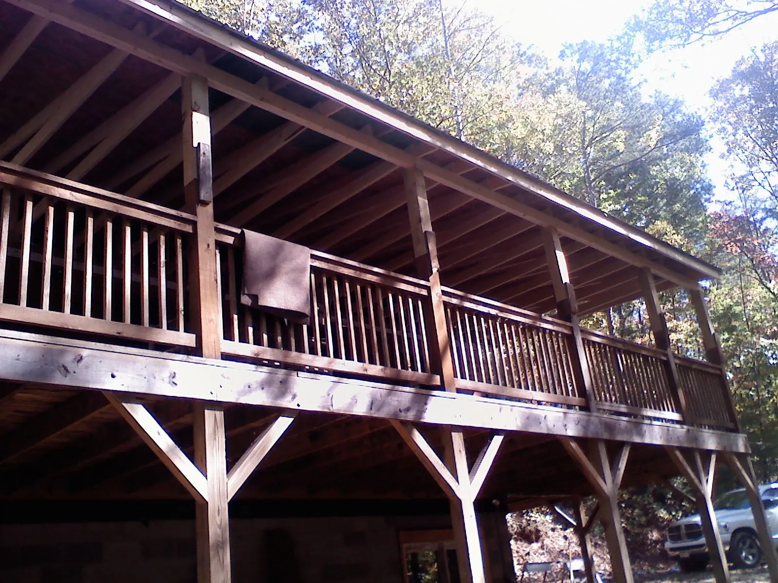 Timber framing under a new elevated porch and deck — Roof Leak Repair in Peninsula by Roofing Brothers